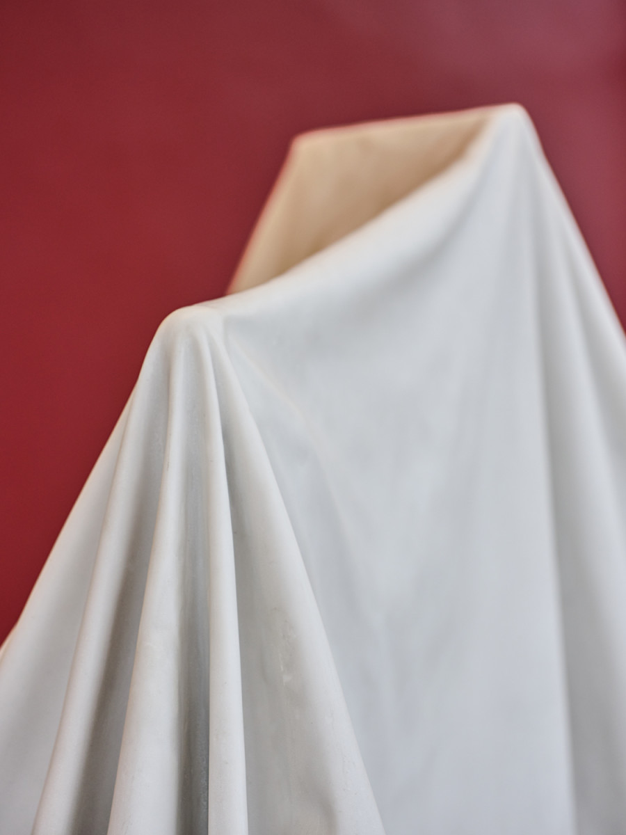 Exhibition View, ‘Stitches: A Haunted House and Other Ghost Stories’ at the Villa Bernasconi, 2026 / Photo by Nicolas Delaroche Studio. Ryan Gander, I is... (i)., 2012, glass fiber, marble powder, Collection Lionel Aeschlimann