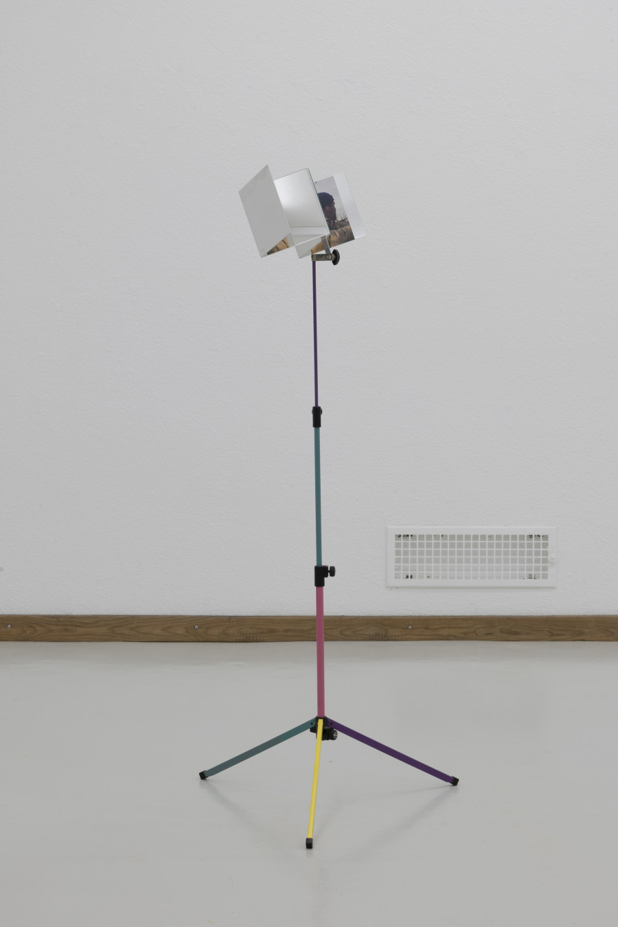 Emanuel Rossetti, Linus, 2024. Two digital c-prints on Fuji Crystal Archive paper, mounted on aluminum, mirrors, music-stand, 140 x 30 x 25 cm. Emanuel Rossetti, Stimmung, installation view, Kunsthaus Glarus, 2024. Photo: Gina Folly. Courtesy of the artist, Karma International, Zurich and Jan Kaps, Cologne.