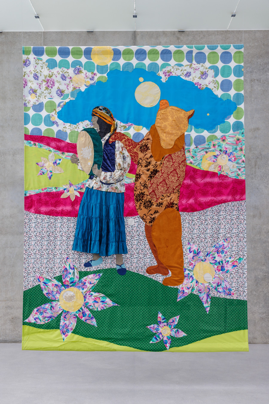 Małgorzata Mirga-Tas, Tełe Ćerhenia Jekh Jag, Exhibition view third floor Kunsthaus Bregenz, 2025, Ryćhino he Romani Ćhaj (A bear and a Roma girl), 2025. Photo: Markus Tretter. © Małgorzata Mirga-Tas, Kunsthaus Bregenz. Courtesy of the artist, Foksal Gallery Foundation, Warsaw, Frith Street Gallery, London, Karma International, Zurich