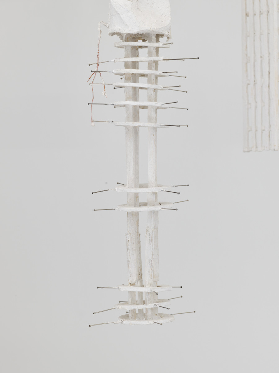 Christiane Blattmann, Dependers, 2025, Barre holders, aluminum, encaustic on jesmonite, stucco plaster and canvas, archival cardboard, steel, 59 × 20 × 29 cm. Damien & The Love Guru, 2025. Courtesy of the artist and Damien & The Love Guru, Brussels/Zurich. Photography : Felix Jungo
