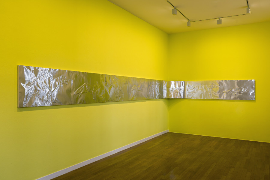 Paula Santomé, Some days belong to the prey, 2025, Handgeprägtes Aluminium / Handmade embossed aluminium, 60 x 810 cm. Kunst Raum Riehen, 2025. Photo: Gina Folly