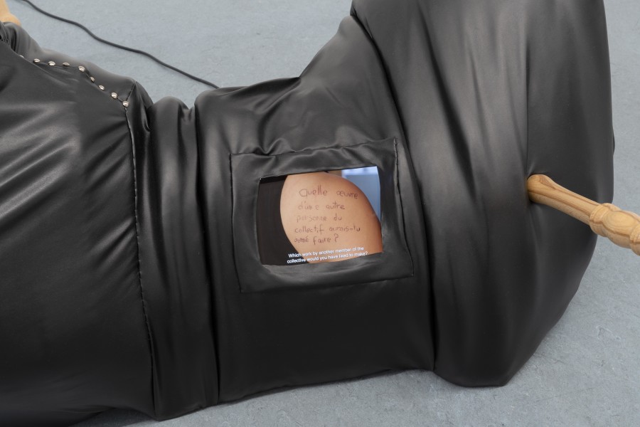 Collectif Je t’aime, If the collective was a tattoo, how many laser sessions would it take to erase it? (detail), 2025, Turned wood, faux leather, and 2-channel video, 82 × 160 × 200 cm, 15:31’, 09:15’ Video credits: Lester Kielstein. Photo credits: marytwo