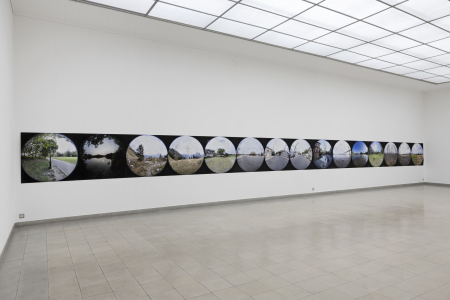 Emanuel Rossetti, Walks, 2024. UltraChrome HDR ink on Enhanced Matte paper, mounted on linen, 110 x 1650 cm. Emanuel Rossetti, Stimmung, installation view, Kunsthaus Glarus, 2024. Photo: Gina Folly. Courtesy of the artist, Karma International, Zurich and Jan Kaps, Cologne.