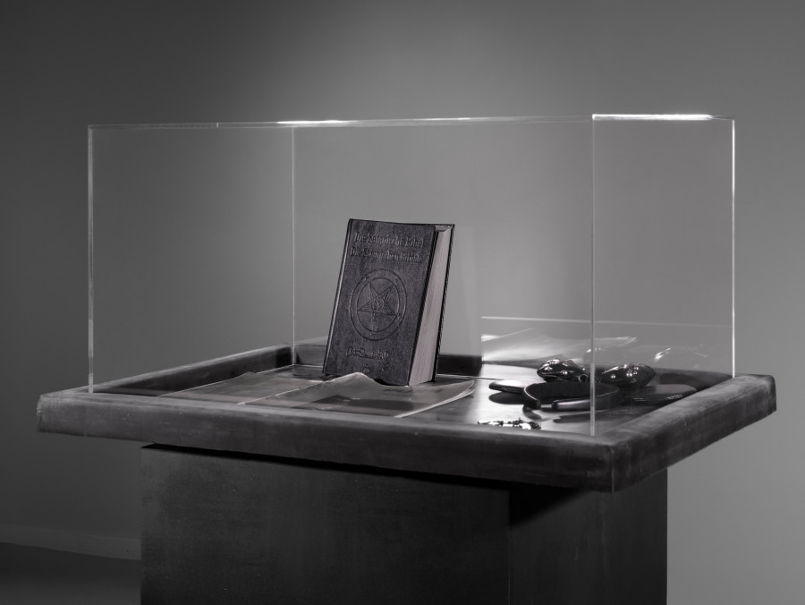 Julian-Jakob Kneer, FANATIC (8), 2025, Archival Satanic Bible, WWJD bracelet, Disneyland Tokyo headband, archival Peter Sotos PURE #1 zine, cast rubber and acrylic glas vitrine, 76 x 54 x 35 cm. Courtesy the artist and Blue Velvet, Zurich. Exhibition views by Andrea Luca Ammann.