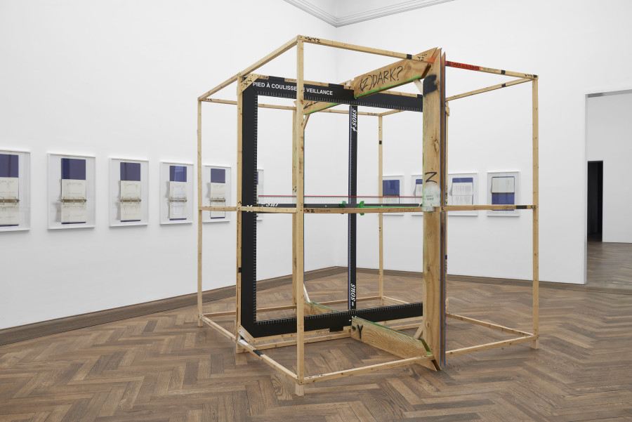 Installation view, INFORMATION (Today), Kunsthalle Basel, 2021, view on American Artist, Veillance Caliper (Annotated), 2021 (front); Alejandro Cesarco, New York Public Library Picture Collection (Subject Headings), 2018 (back, left); Alejandro Cesarco, New York Public Library Picture Collection (Subject Headings – Cross References), 2018 (back, right). Photo: Philipp Hänger / Kunsthalle Basel