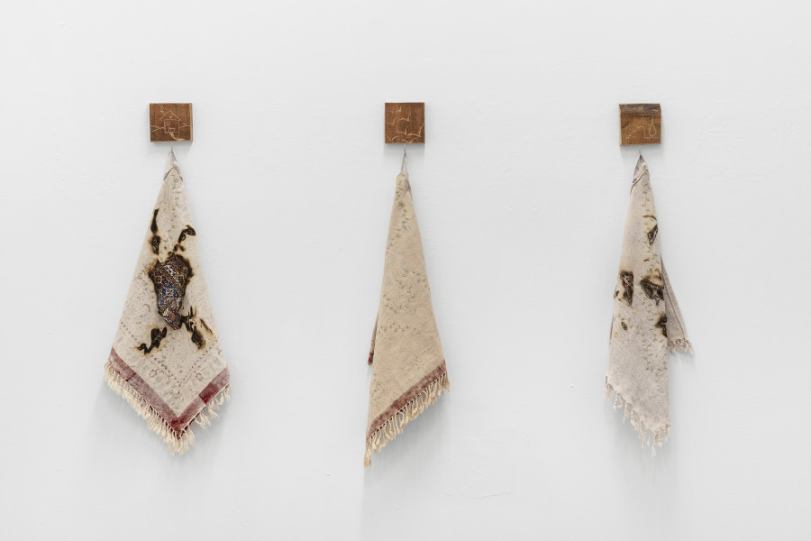Detail of Zahrasadat Hakim,
أحن إلى خبز أمي. I yearn to my mother’s bread, 2023, 10 embroidered cloths, carved wood 50 x 45 cm each. Courtesy of the artist and La Rada, Locarno. Photography by Riccardo Giancola