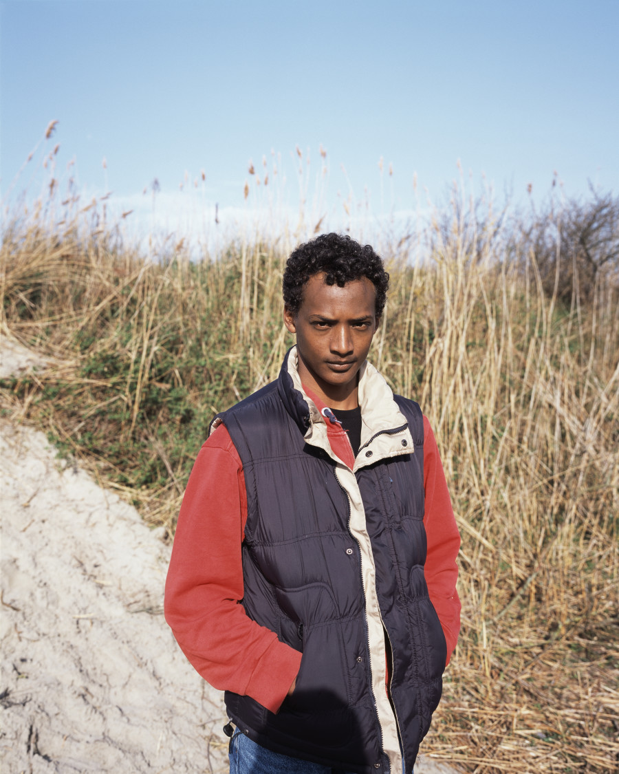 Ahmed, heading for the Jules Ferry day centre, Calais, Thursday 16 April 2015. Inkjet print (Canson Baryta Photographique paper) mounted on Dibond, Plexiglas box, 63.5 x 51 x 5 cm, Ed. 1/5 + 2 AP