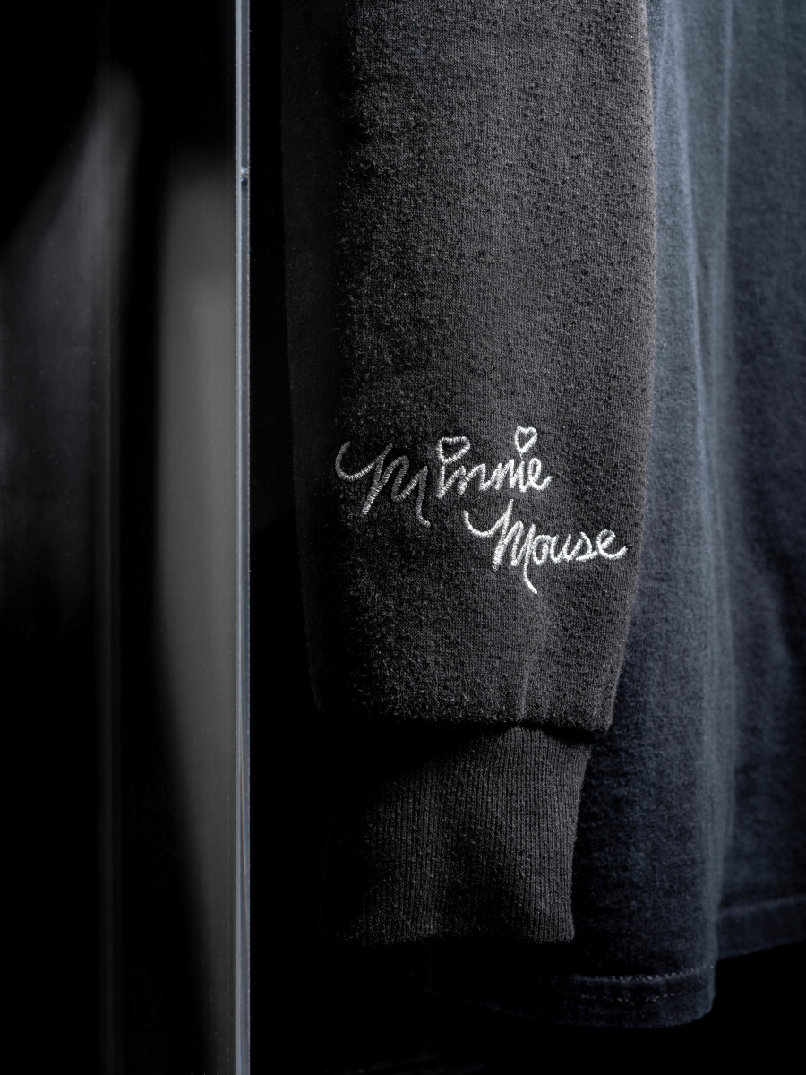 Julian-Jakob Kneer, FANATIC (7) (Detail), 2025, Archival Deathlike Silence Productions t-shirt, Minnie Mouse hoodie, 
cast rubber and acrylic glas vitrine, 106 x 76 x 22 cm. Courtesy the artist and Blue Velvet, Zurich. Exhibition views by Andrea Luca Ammann.