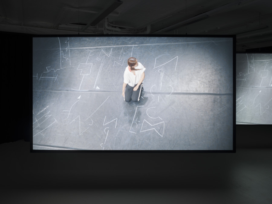 Hwayeon Nam, Throbbing Dance, 2017, three channel video 10’57’’, exhibition view at CAN Centre d’art Neuchâtel, 2025. Photography: Sebastian Verdon. Courtesy: All images courtesy of Hwayeon Nam and CAN Centre d’art Neuchâtel