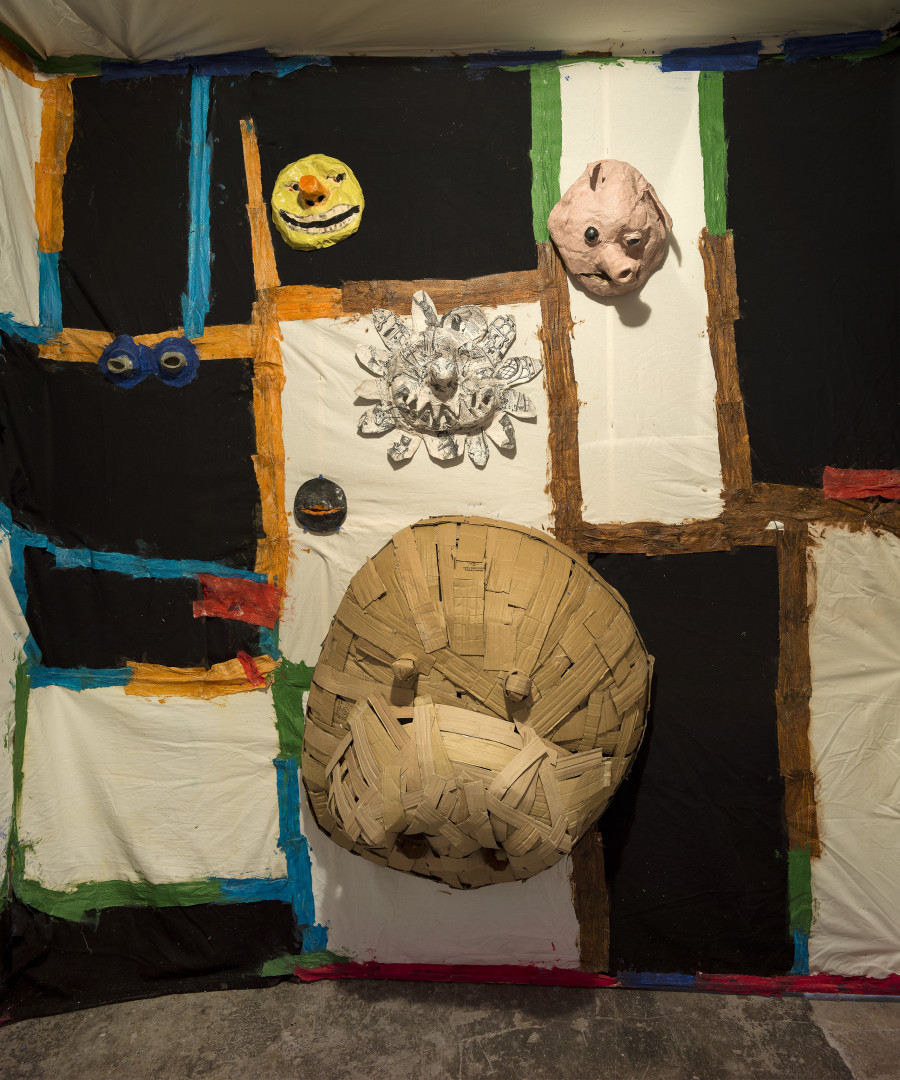 Exhibition view Monster Chetwynd «Profusion Protrusion», Cabaret Voltaire 2023; Monster Chetwynd, Green Ceramic Eyes, 2023; Edition/Yellow, 2023; Ceramic Mouth/Obsidion, 2023; Papermaché/make Alice in Wonderland, 2022; Big Doggy Mask, 2023; Pig, 2019. Photo: Cedric Mussano.