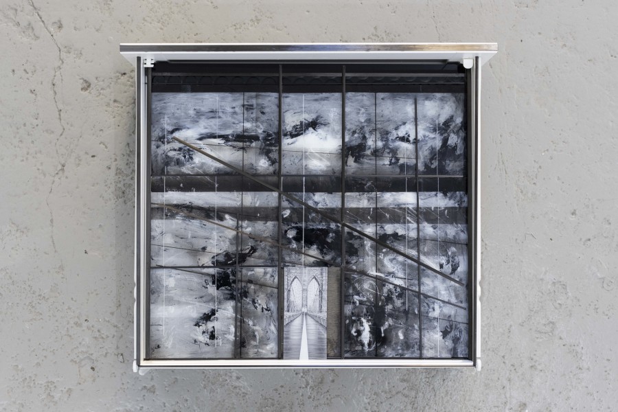 Sebastian Haas, “Marks of Rain, Not Rain”; from the Solo Show “Reminisce-Supports” at KALI Gallery, Lucerne, CH; Oil, spraypaint on reverse glass, plexiglass, carbon, wood; 60 x 55 x 30 cm, 2026. Courtesy of the Artist and KALI Gallery. Photo by Kim da Motta