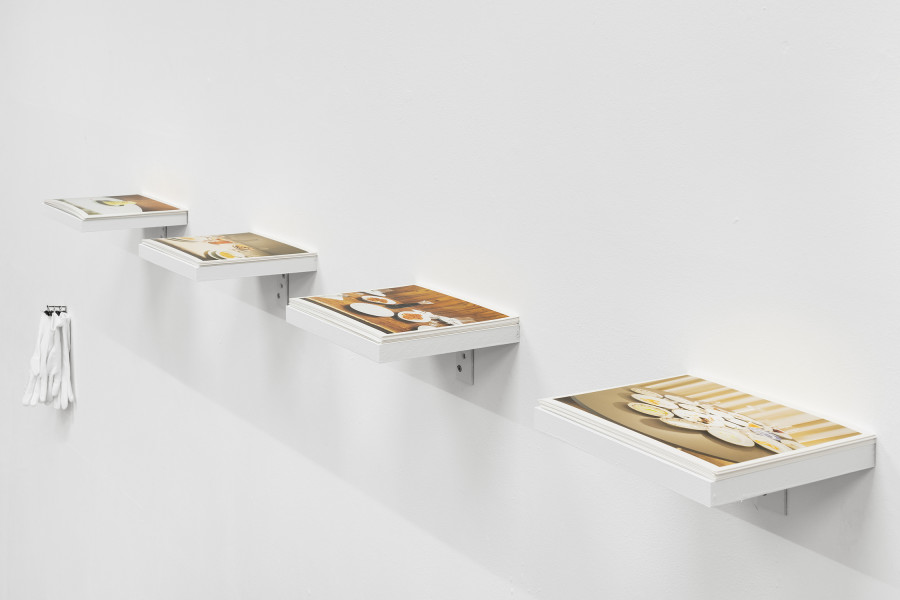 Detail of Jacopo Valentini, From the series Paesaggi da Tavola (Trattoria Due Platani - Trattoria Entrà - Osteria di Medicina - Da Lucio Trattoria), 2023. Inkjet print, wood and cotton gloves, 20 x 220 cm. Courtesy of the Artists and La Rada, Locarno. Photography by Riccardo Giancola