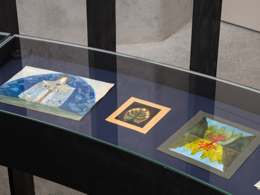 Exhibition view Emma Jung & Rebecca Ackroyd «Tage und Nächte», Cabaret Voltaire 2025; Emma Jung-Rauschenbach, Drawing of the Madonna of Mercy, undated; Drawing of a candelabrum, 1917; Drawing of a red tree, undated. Photo: Cedric Mussano. Courtesy: Familienarchiv Jung, © 2007 Stiftung der Werke von C.G. Jung, Zürich.