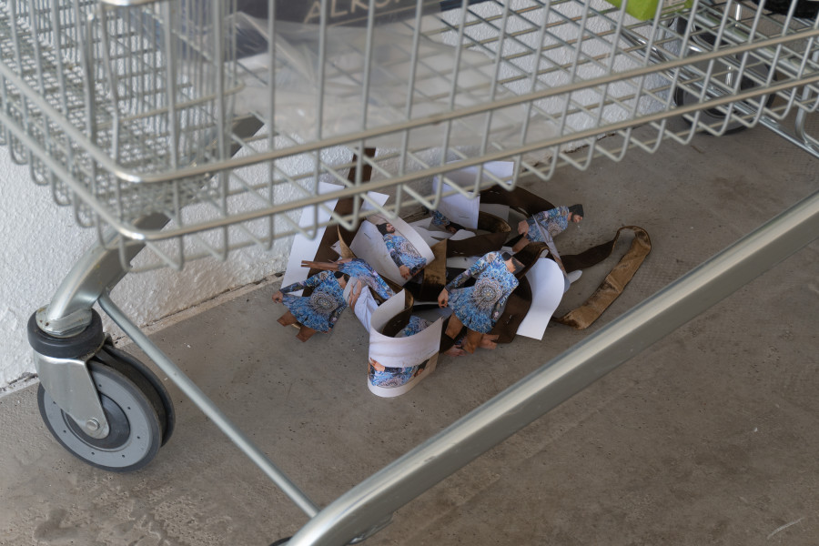 Exhibition view, Sven Gex, celebratory, Halmet, Zürich, 2025. Sven Gex, garland for ‚celebratory‘ (holbein/mcqueen), 2025, hand cut printed pictures, staples, velvet ribbon