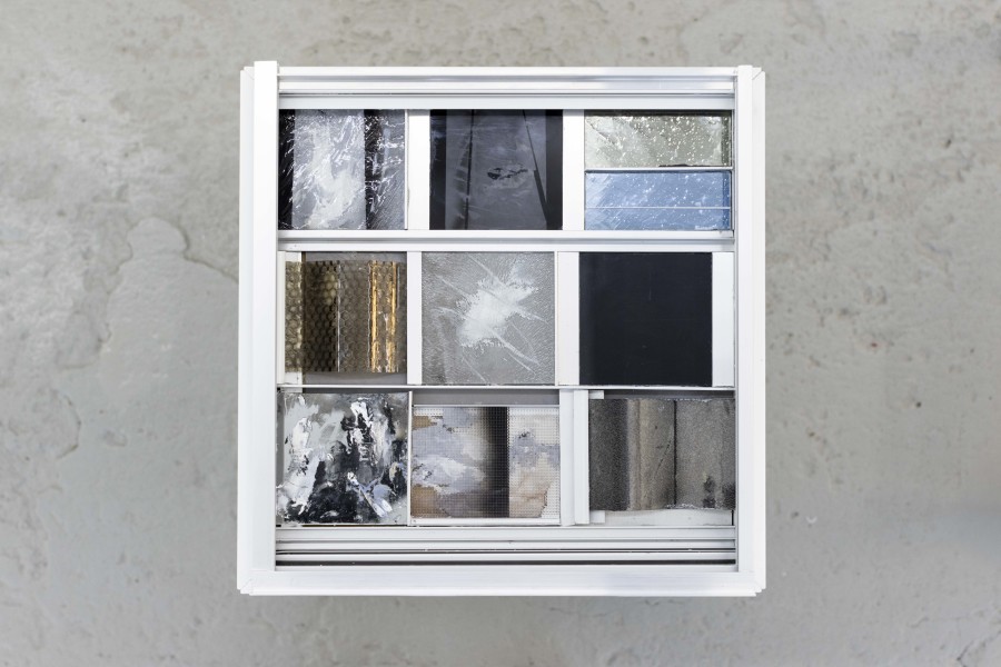 Sebastian Haas, “Between Glass and Wall” (detail); from the Solo Show “Reminisce-Supports” at KALI Gallery, Lucerne, CH; Oil, spraypaint on reverse glass, plexiglass, carbon, aluminium, wood; 35 x 35 x 35 cm, 2025. Courtesy of the Artist and KALI Gallery. Photo by Kim da Motta