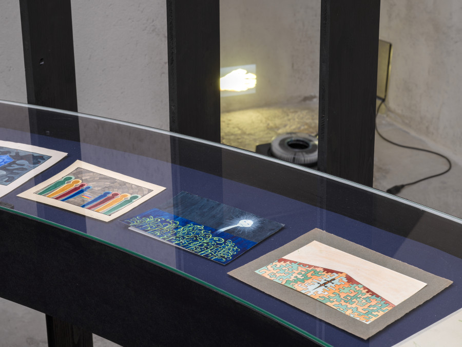 Exhibition view Emma Jung & Rebecca Ackroyd «Tage und Nächte», Cabaret Voltaire 2025; Emma Jung-Rauschenbach, Watercolor of a cellar vault with colorful figures, undated; Image of a spirit over a water gar- den, undated; Watercolor of a salamander in a labyrinth, undated; Rebecca Ackroyd, The World as it is, 2025. Photo: Cedric Mussano. Courtesy: Familienarchiv Jung, © 2007 Stiftung der Werke von C.G. Jung, Zürich & the artist.