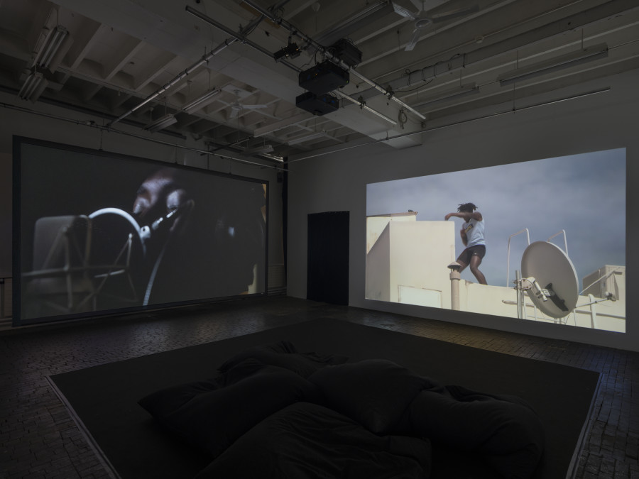 Exhibition view of Re/member Your House with the project the AfroGreeks by Døcumatism and a solo show by Menelaos Karamaghiolis at Centre d’Art Contemporain Genève (November 1st‒December 23, 2023). © Centre d’Art Contemporain Genève. Photo: Julien Gremaud
