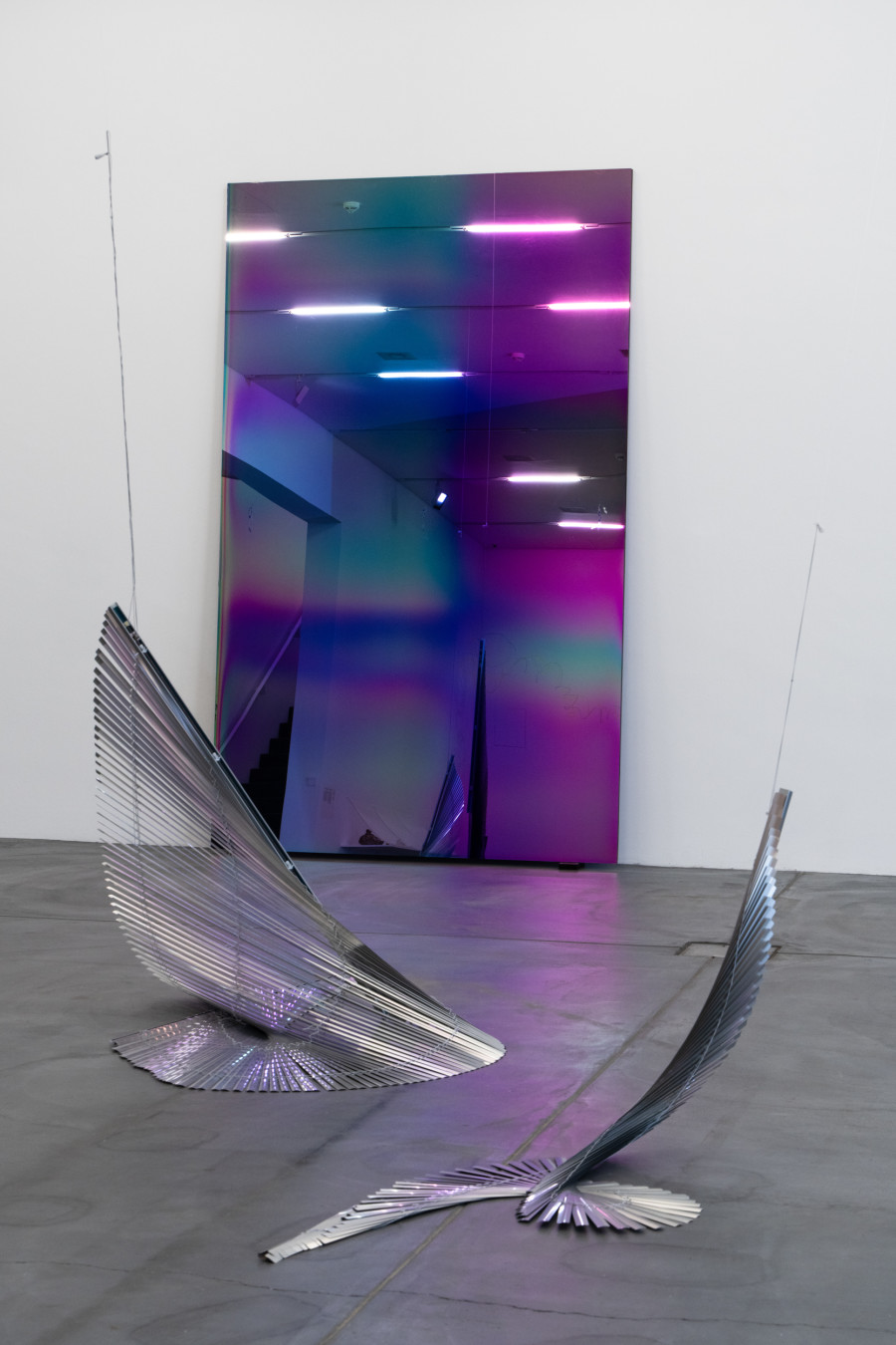 Exhibition view Martín Soto Climént, The Swan Swoons in the Still of the Swirl (Stills 1,2,3,4,5,6), 2010, single-channel video projection (color), blinds, Raphael Hefti, Sub- traction as Addition, 2015, Luxar coated, doubled glazed museum glas, Sammlung Migros Museum für Gegenwartskunst. Photo: Studio Stucky, copyright Martín Soto Climént, Raphael Hefti